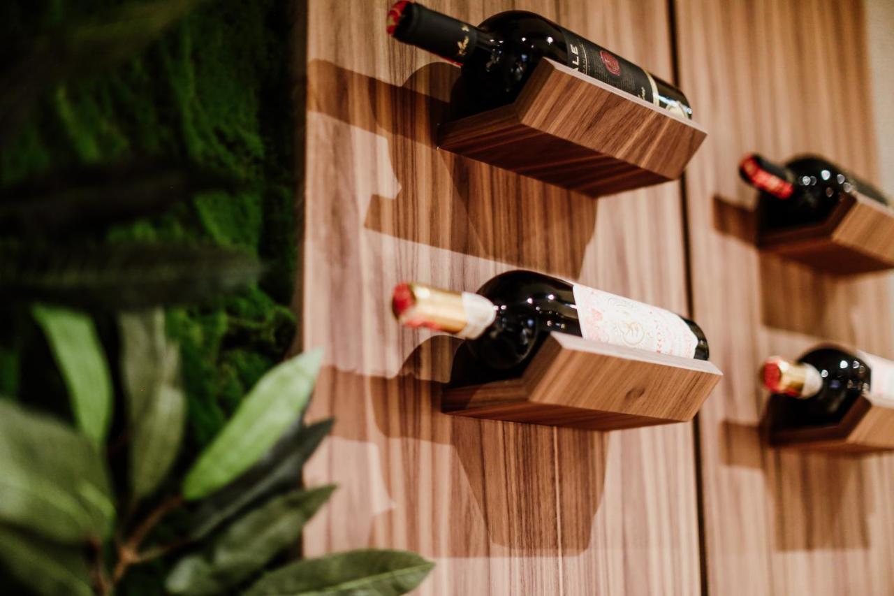 Klajdi Resort & Spa 골렘 외부 사진 Wine bottles stored on a wall mounted wine rack